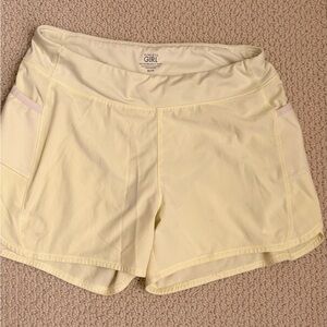 Athleta Light Yellow Athletic Shorts